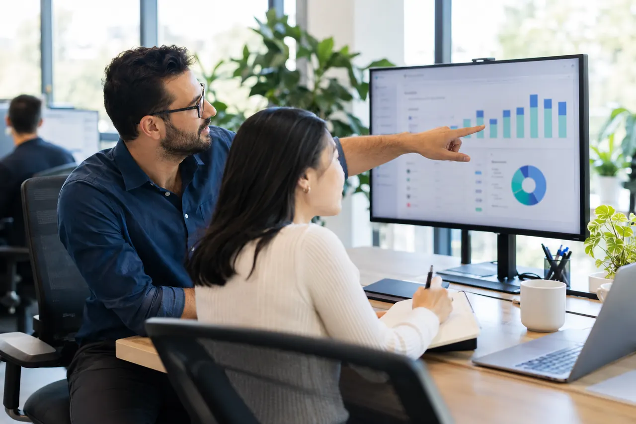 Deliverability specialist walking a colleague through inbox placement results