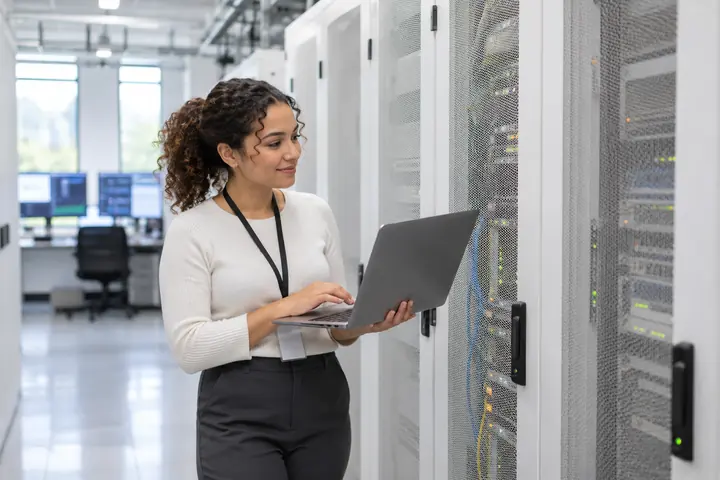 Engineer configuring dedicated email servers and IP warm-up in a data center
